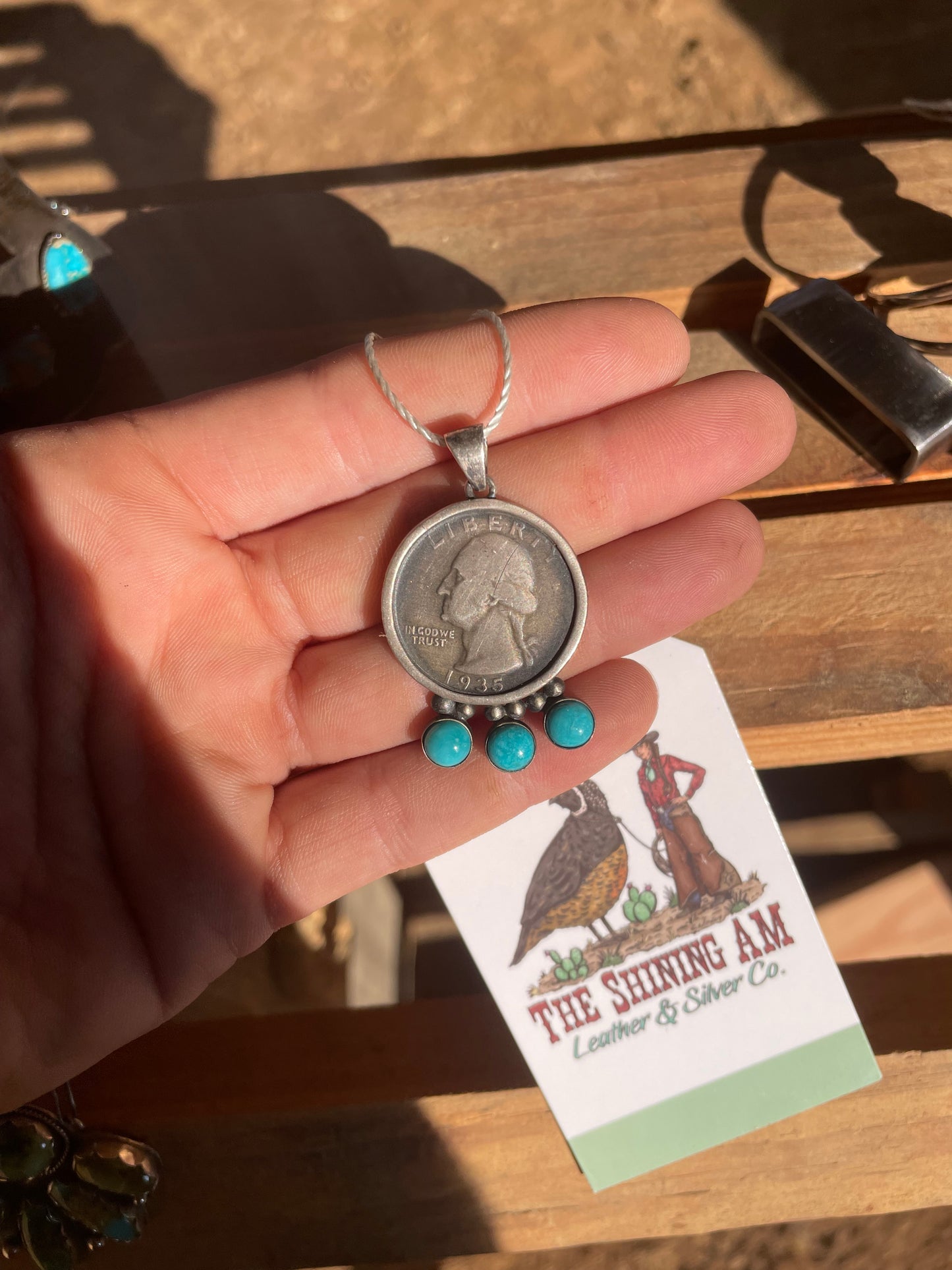 Navajo made quarter pendant